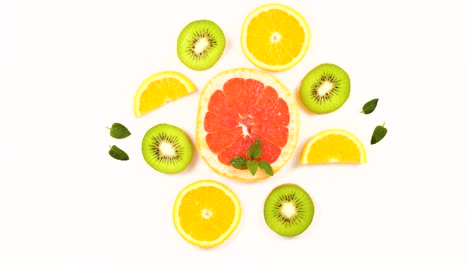 citrus fruit in round isolated on white background