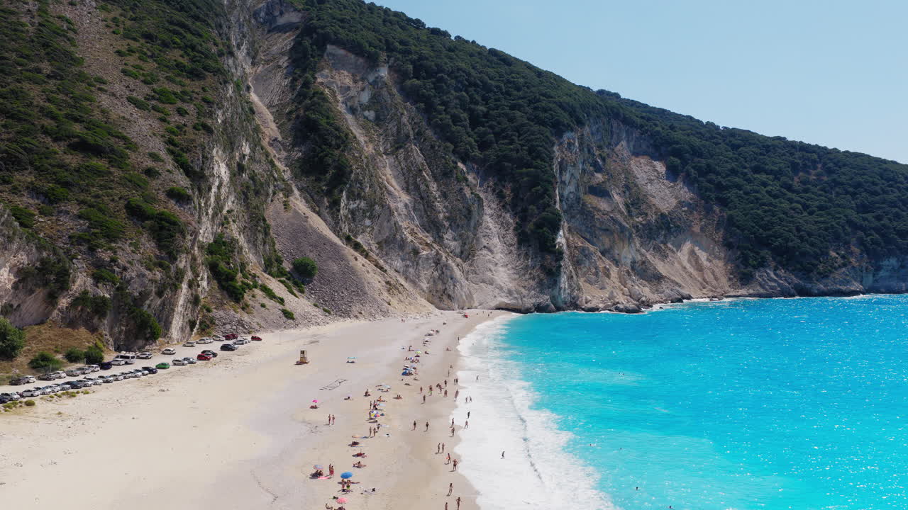 Breathtaking aerial view of secluded beach framed by cliffs in Ionian Sea, Myrtos beach on Kefalonia island in Greece