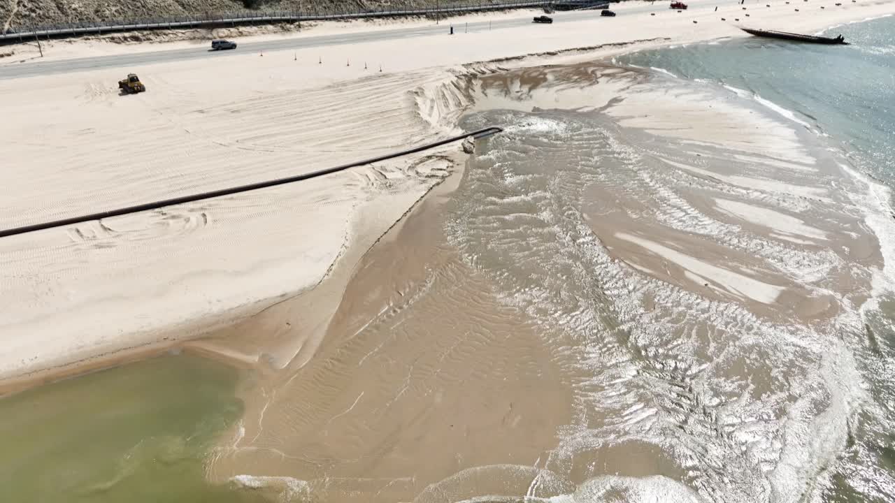 Dredged sand repairing Winter Damage