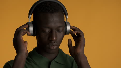 african american man on yellow background.