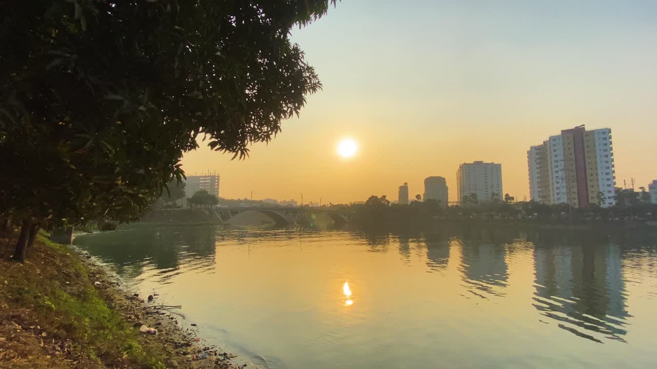 Golden Orange Yellow Sunset Above Lake In Urban Area, Static View