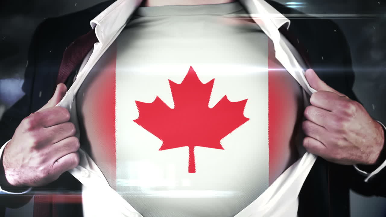 un hombre de negocios abre su camisa para revelar la bandera de canadá.