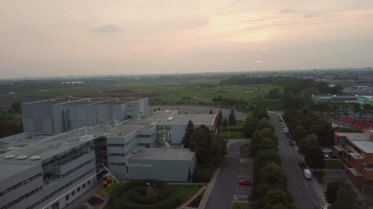 Montreal sunset aerial fly away from Frederic-Back Park in Saint Michel