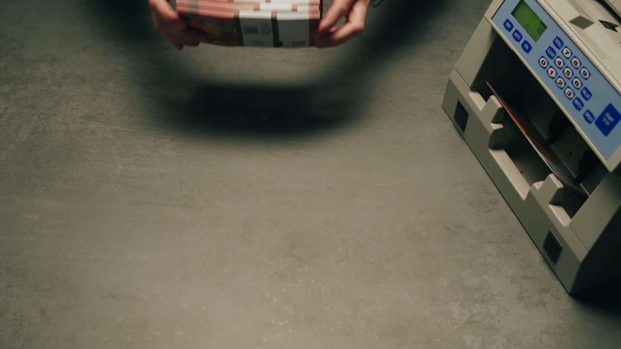 Specialised police officer Counting dollar banknotes in crime lab, conceptual image. High quality 4k footage