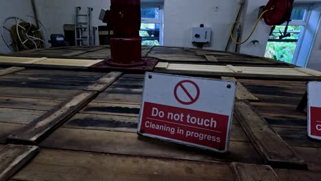 sign indicating cleaning in progress at glengoyne