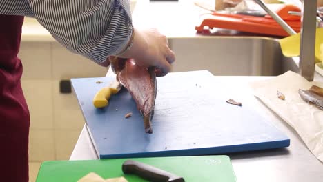 time lapse of a chef skinning a fish