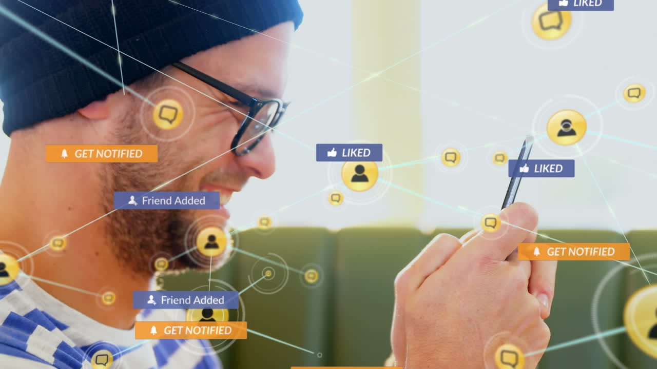 Animation of social media icons and network of connections over caucasian man using smartphone