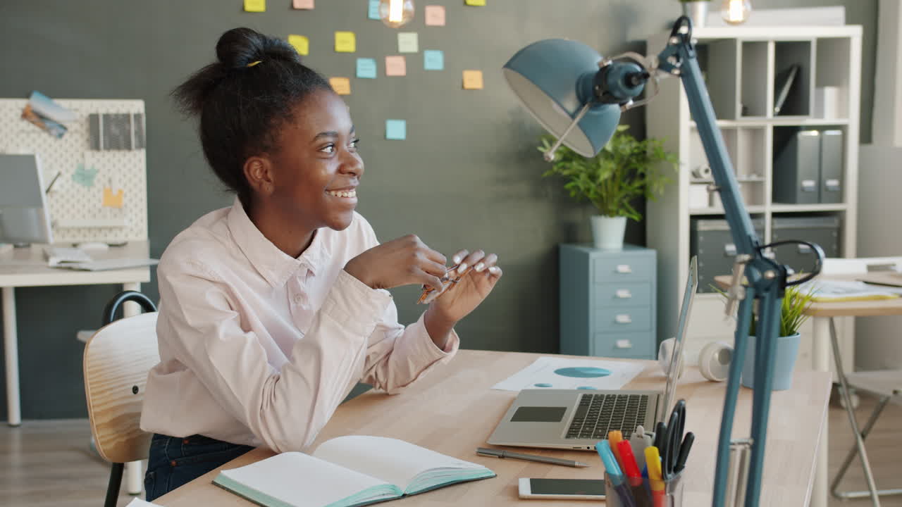 Young Woman Working at a Desk