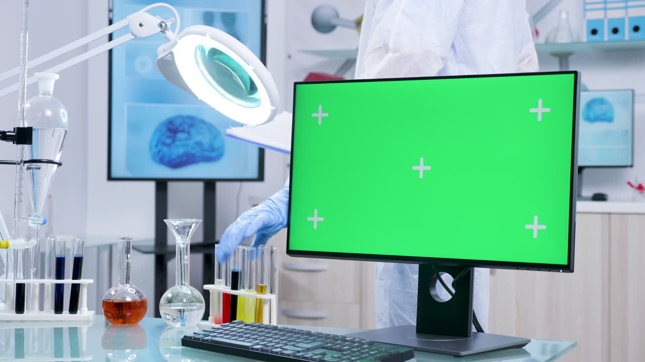 Laboratory with Green Screen Monitor and Scientific Equipment
