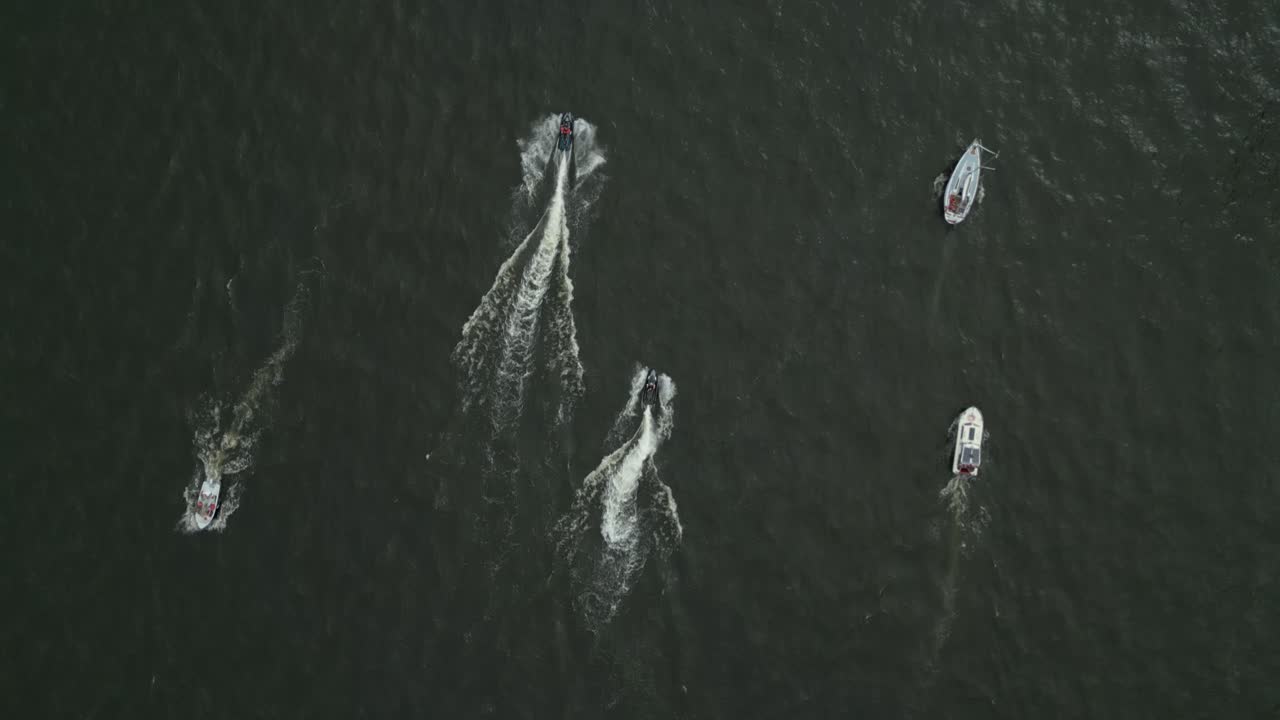 Aerial View of Boats and Jet Skis on the Water