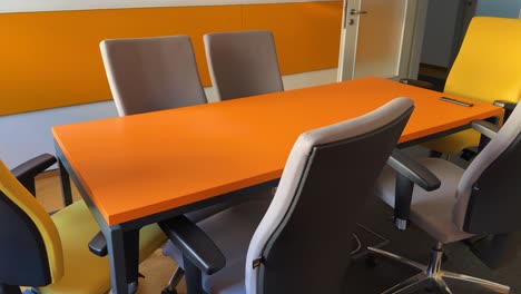 empty corporate meeting room with chairs
