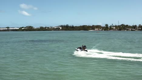 Aerial-video-of-jet-ski-traveling-through-the-florida-keys