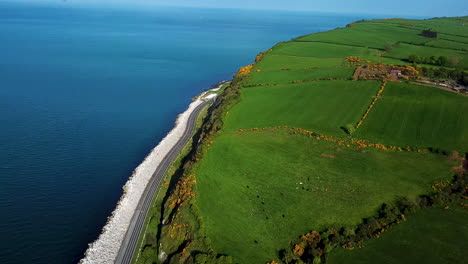 Cinematic-aerial-view-of-coastline-in-northern-Ireland