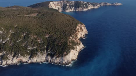 cape lefkada and surrounding cliffs, aerial view camera tilt