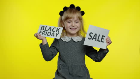 Child-kid-showing-Black-Friday-and-Sale-word-discount-advertisement-banners.-Low-prices,-shopping