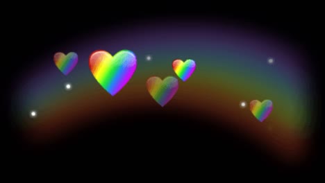 animación forma de corazones coloridos flotando en el fondo negro.