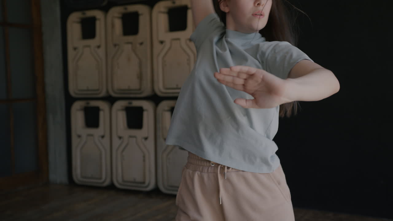 Teenage Girl Dancing in Studio