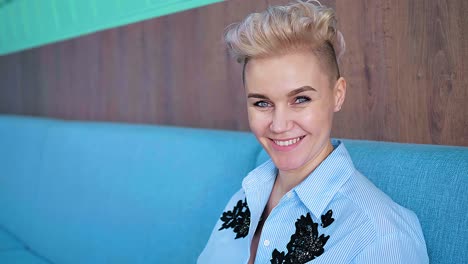 smiling woman in a cafe