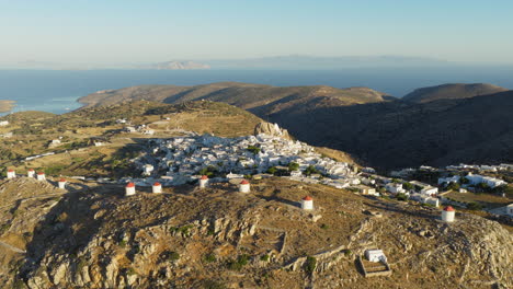 historic chora village in amorgos island with windmills and white cycladic houses, greek heritage travel