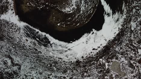 top down aerial view of volcano in iceland