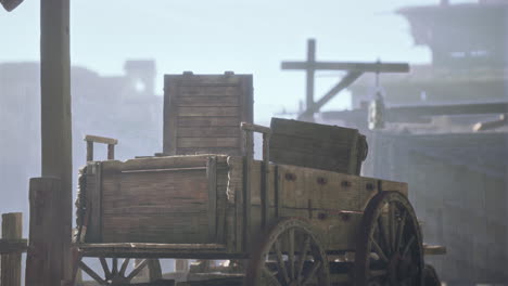 abandoned wooden cart in a desolate western town