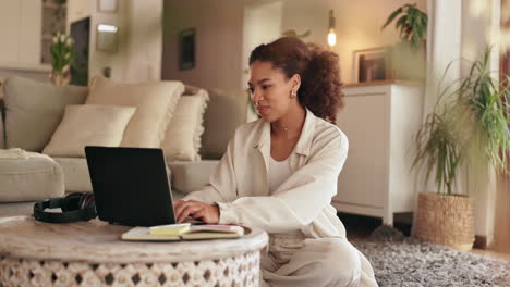 woman working on laptop at home