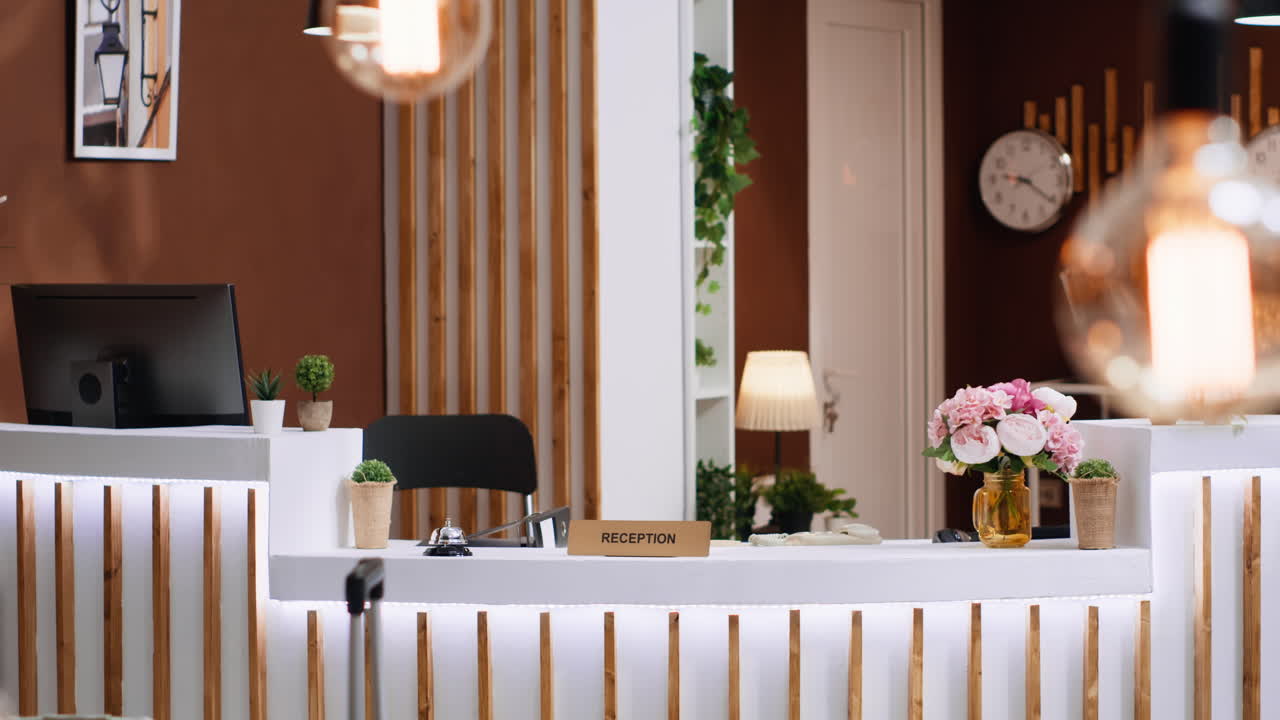 Five star hotel lobby with empty front desk at reception