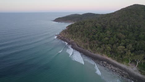 aerial drone view of little cove beach at noosa national park in queensland, australia