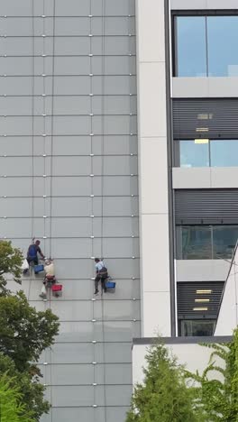 building cleaning crew on high-rise