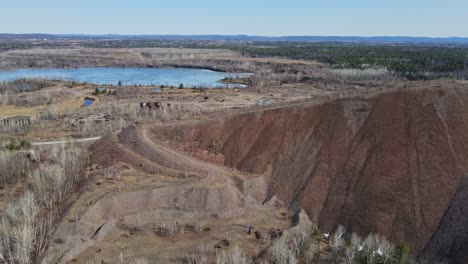 abandoned iron mine spoil pile in canadian landscape