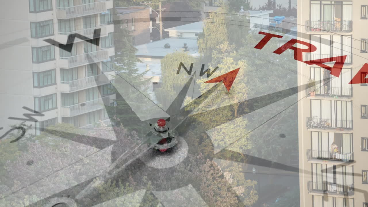 Compass needle pointing north with animation of TRAVEL text over urban landscape