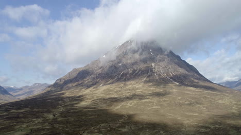 aerial footage of buachaille etive mor mountain at the entrance to glen etive, scottish highlands