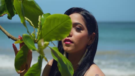 close up of a latina girl pretty face on a sunny day at the beach