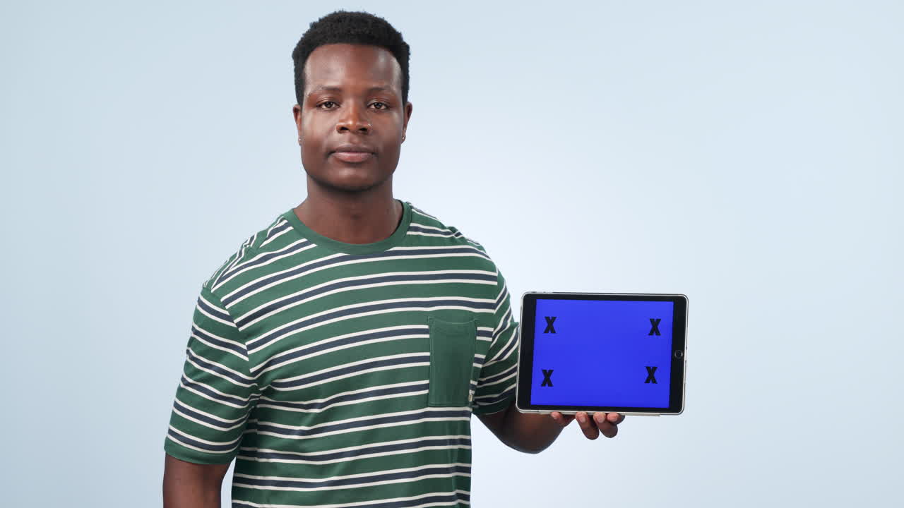 Tablet screen, happy black man