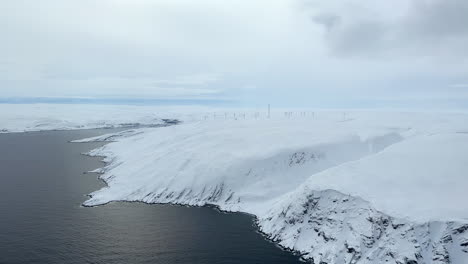 Aerial view of a Wind park destroying the nice landscape in the surrounding area, Northern Norway, Finnmark