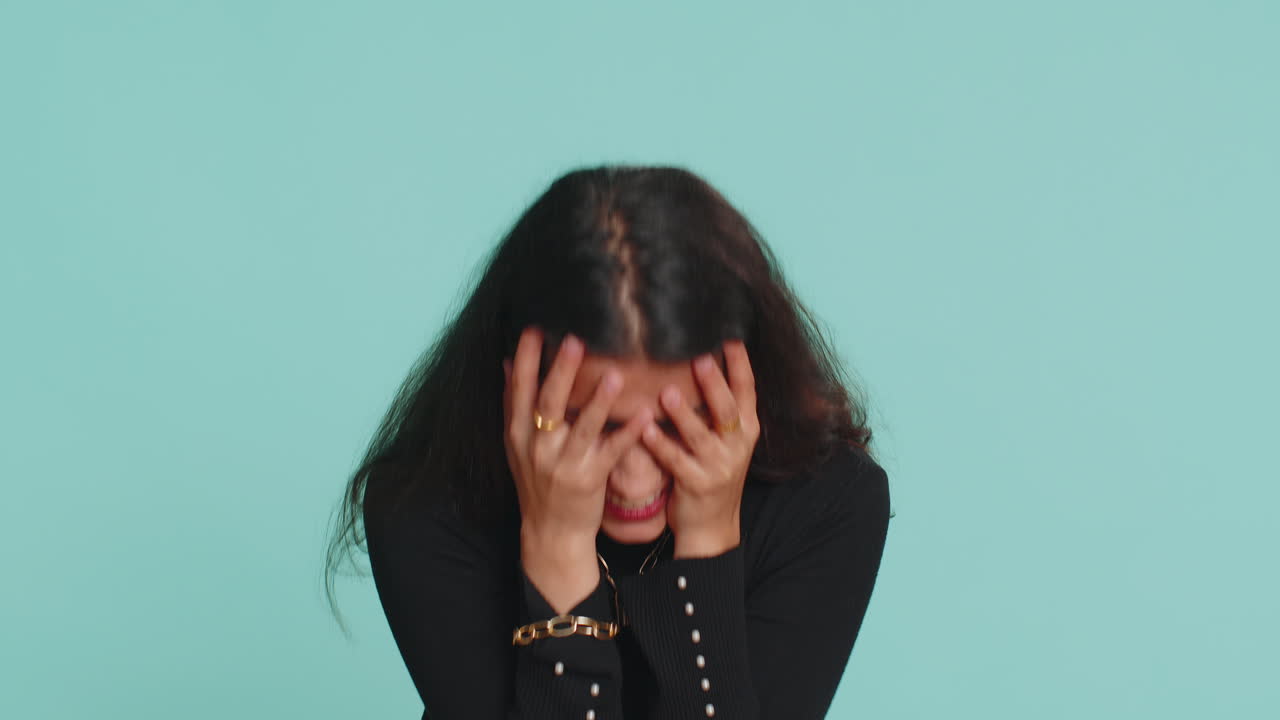 Arabian indian woman loses becoming surprised by lottery results, bad fortune, loss, unlucky news