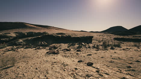 desert landscape with sun in the sky