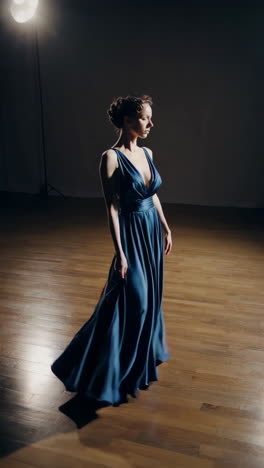 elegant woman in a blue gown