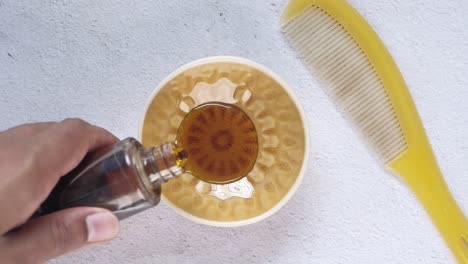 applying hair oil treatment