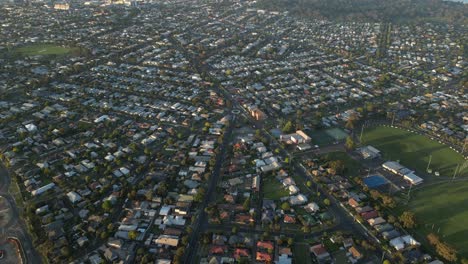 Aerial-Shot-Of-Geelong-City-At-Sunset,-Suburb-Close-to-Melbourne,-Victoria-State,-Australia