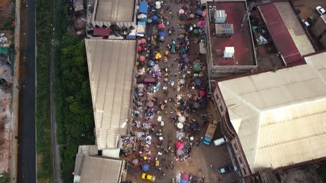 drone shot tilting over the mfoundi market in yaounde, cameroon, africa