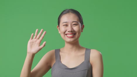 woman waving hello