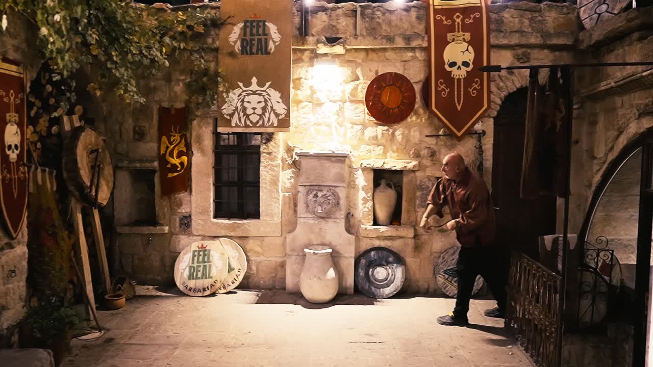 Medieval Fantasy Scene: Man in a Stone Courtyard