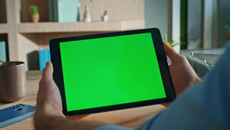 closeup hands holding mockup tablet in office close up. unknown businessman