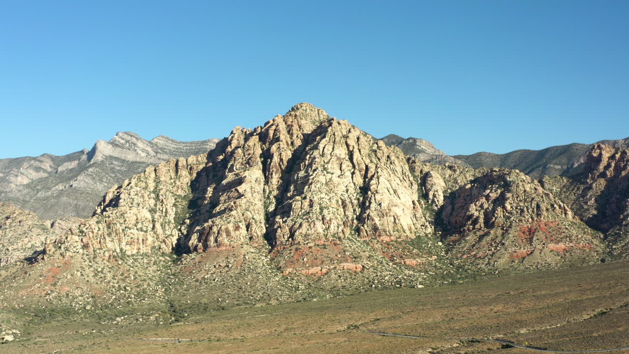 Rugged Desert Mountains Under a Clear Blue Sky