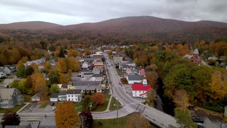 new england in fall ludlow vermont aerial pullout