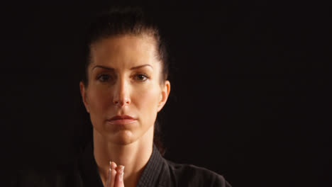 karate player in prayer pose