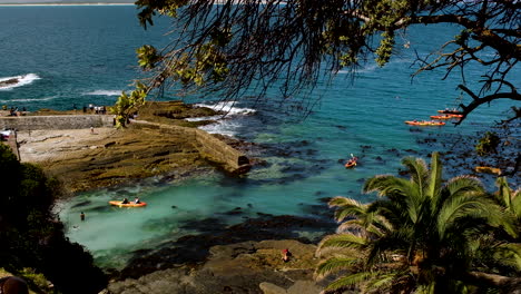 Tourists-return-from-kayaking-activity-in-Walker-Bay,-Hermanus