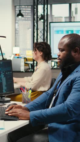 vertical video black engineer uses artificial intelligence systems for data mining