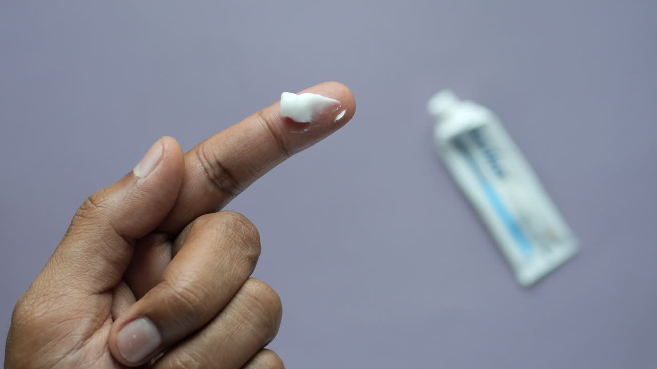 Applying Toothpaste on Finger